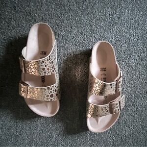 gold birkenstock gold embosed leather, never worn
